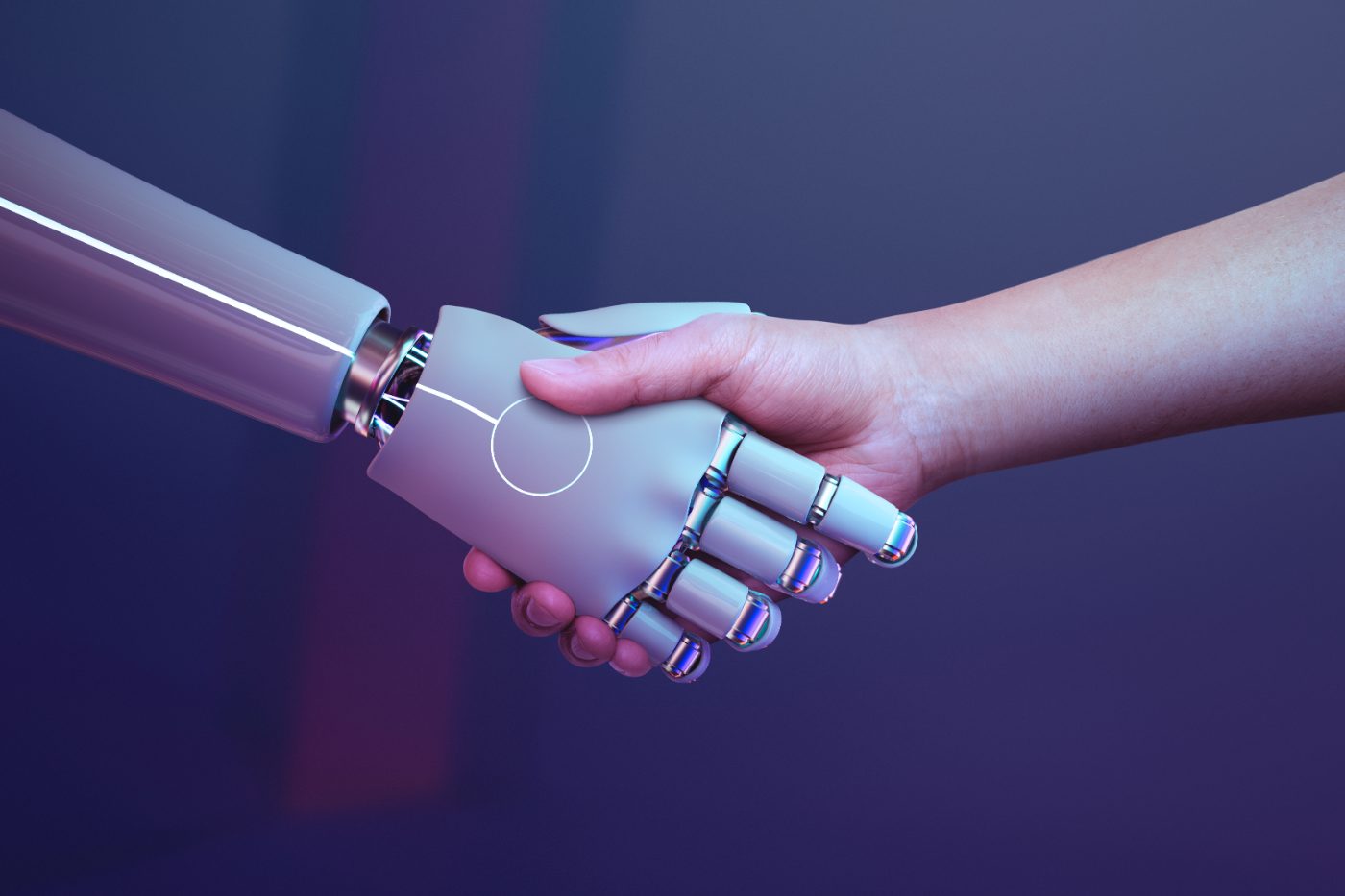 Poignée de main entre une main humaine et une main robotisée